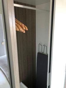 a sliding glass door with some bread on it at Résidence Saradon La Zenia Boulevard in Los Dolses