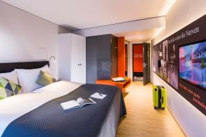 Postel nebo postele na pokoji v ubytování Hotel Arte