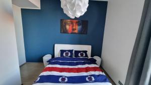 Postel nebo postele na pokoji v ubytování Kalamaja apartment - Kotzebue 33