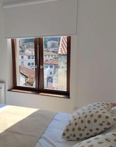 Postel nebo postele na pokoji v ubytování Apartamentos la Garita - El Taller - Cudillero