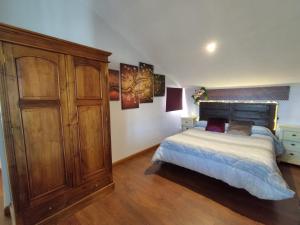 Un pat sau paturi într-o cameră la AlmenaraLove El Mirador