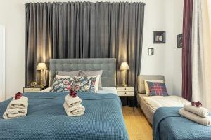 Katil atau katil-katil dalam bilik di A Prague Apartments - Lesser Town