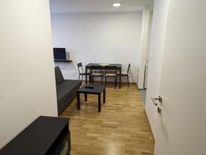 TV a/nebo společenská místnost v ubytování APARTMAN Verona