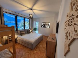 Posteľ alebo postele v izbe v ubytovaní Apartament z jacuzzi Zakopane