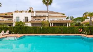 Bazén v ubytovaní Luxury apartment at Monte Paraiso alebo v jeho blízkosti