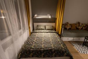 Uma cama ou camas num quarto em Harmony apartman