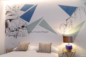 Posteľ alebo postele v izbe v ubytovaní Cervantes 5 Collection - Bisagra Delux
