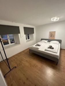 Ένα ή περισσότερα κρεβάτια σε δωμάτιο στο Appartement der Bürgerbote zur Hohen Salve