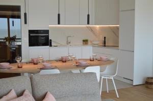 Cucina o angolo cottura di Zeezicht vanop het 6 de verdiep