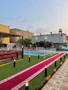 a race track in front of a water park at شاليه الجوهرة الدرب in Ad Darb