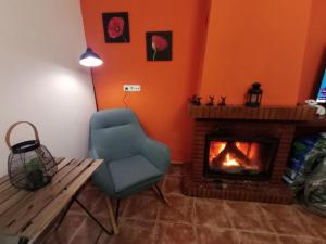 Posedenie v ubytovaní Casa Rural Agua de Azahar Chimenea