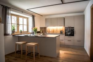 Kuchyň nebo kuchyňský kout v ubytování Müllner Appartements