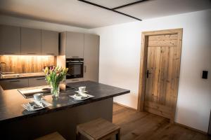 Kuchyň nebo kuchyňský kout v ubytování Müllner Appartements