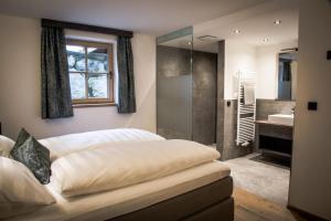 Postel nebo postele na pokoji v ubytování Müllner Appartements