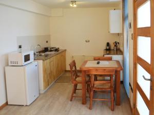 Cucina o angolo cottura di Apart Hotel Quillango