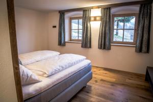 Postel nebo postele na pokoji v ubytování Müllner Appartements