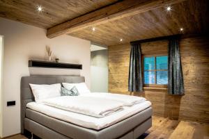 Postel nebo postele na pokoji v ubytování Müllner Appartements