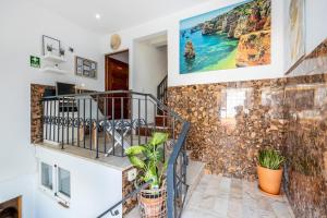 Μια τηλεόραση ή/και κέντρο ψυχαγωγίας στο 3 Marias Guest House B&B