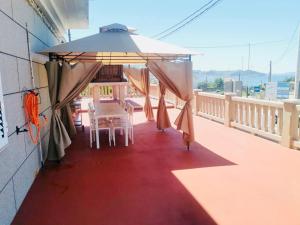 Balkon lub taras w obiekcie Villa Playa Portomayor BUEU
