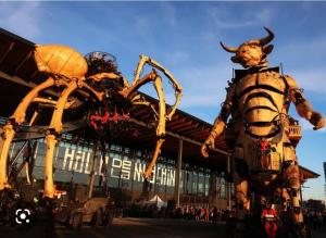 a giant spider sculpture in front of a building at Chez mimi in Toulouse