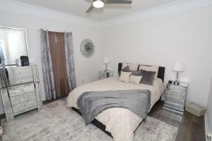 Llit o llits en una habitació de Golf community/Beautiful house with a golf view