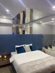 Postel nebo postele na pokoji v ubytování SpaNish apartman