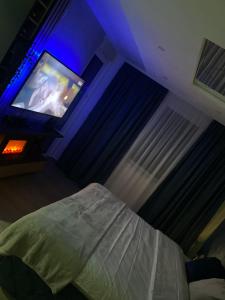 Postel nebo postele na pokoji v ubytování SpaNish apartman