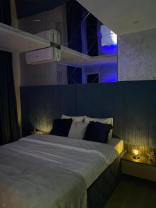 Postel nebo postele na pokoji v ubytování SpaNish apartman