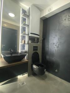 Koupelna v ubytování SpaNish apartman