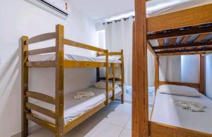 Cama ou camas em um quarto em Resort Beira-Mar - Porto de Galinhas