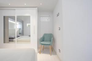 A bed or beds in a room at Green House Morin - San Pietro