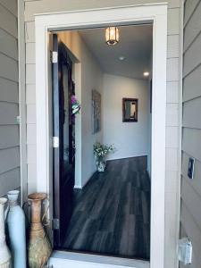 a hallway of a home with a door open at Cheerful three-bedroom home in San Antonio