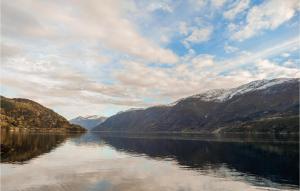 a view of a body of water with mountains at 3 Bedroom Pet Friendly Home In Vallavik in Vangsbygd
