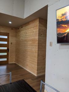 TV a/nebo společenská místnost v ubytování Cabaña Coigües Balneario Punta de Lapas