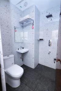 Koupelna v ubytování Hotel Vijaya Grand