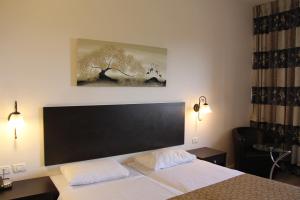 Postel nebo postele na pokoji v ubytování Restal Hotel + 37 fotografií
