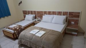 Postel nebo postele na pokoji v ubytování Hotel Dalias