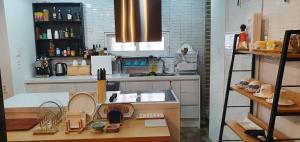 Cucina o angolo cottura di Yachtie Inn Mokpo