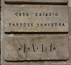 a stone wall with the wordsazaazaazaazaazaazaazaazaazaaza at Casa Palacio PAREDES SAAVEDRA by ATRIO in Cáceres