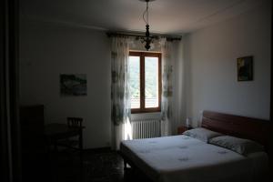 Posteľ alebo postele v izbe v ubytovaní Agriturismo Costamagna