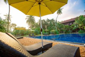 Bazén v ubytování Celestia Ayurveda Resort nebo v jeho okolí