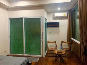 Une Jai Place เรือนอุ่นใจ的休息区