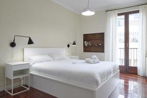 Posteľ alebo postele v izbe v ubytovaní Zinema - Basque Stay
