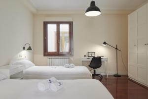 Posteľ alebo postele v izbe v ubytovaní Zinema - Basque Stay