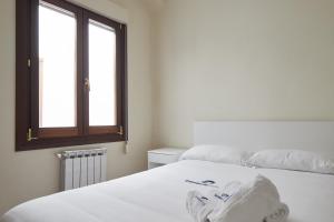 Posteľ alebo postele v izbe v ubytovaní Zinema - Basque Stay