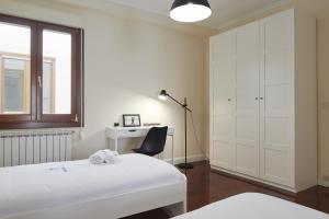 Posteľ alebo postele v izbe v ubytovaní Zinema - Basque Stay