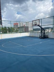 a basketball hoop on a tennis court at Premium Service Appartment in Seri Kembangan