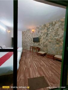 Afbeelding uit fotogalerij van Tathastu Resort in Mukteswar