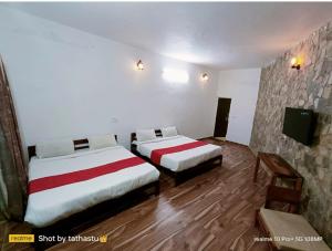 Afbeelding uit fotogalerij van Tathastu Resort in Mukteswar