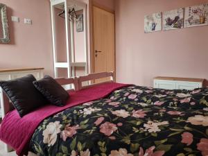 Postel nebo postele na pokoji v ubytování B&B Benvenuto
